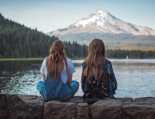 Two girls exploring interesting getaway ideas in Oregon